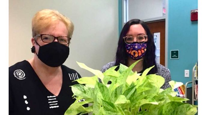 Clermont Garden Club Presents A Pothos To Cooper Memorial Library
