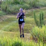 Junior Hanna Warren descending one of the many hills along the NTC course