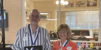 Kiwanis Club of Clermont -(L) Thom Battisto is honored with the Hixson Award (R) presented by Joan Kyle