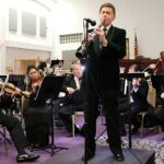 FLS — Carl Topilow and FLSO musicians