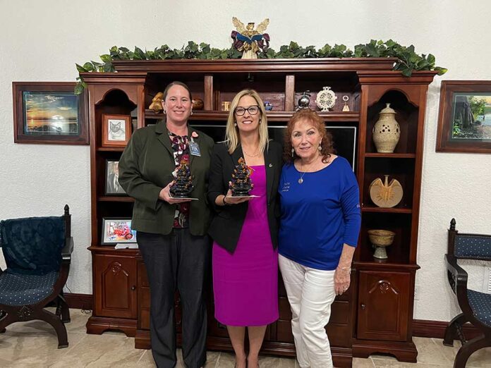 Pictured: Shannon Herrera, Dr. Laura Byrd and Beta Theta Member Michelle Delaney