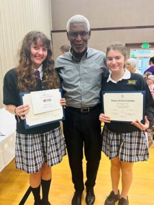 Junior Gianna Dvoran and Senior Alexa Fox with Clermont Mayor Tim Murry
