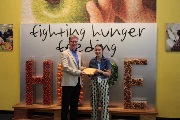 Steve Ferrell and Veronica Mucha from Second Harvest - Check presentation