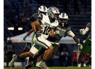 Eagles Fall to Evans 48-17 Despite Strong First-Half Effort
